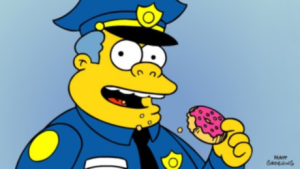 Chief Wigggum and a doughnut from The Simpsons. Copyright Matt Groenig.